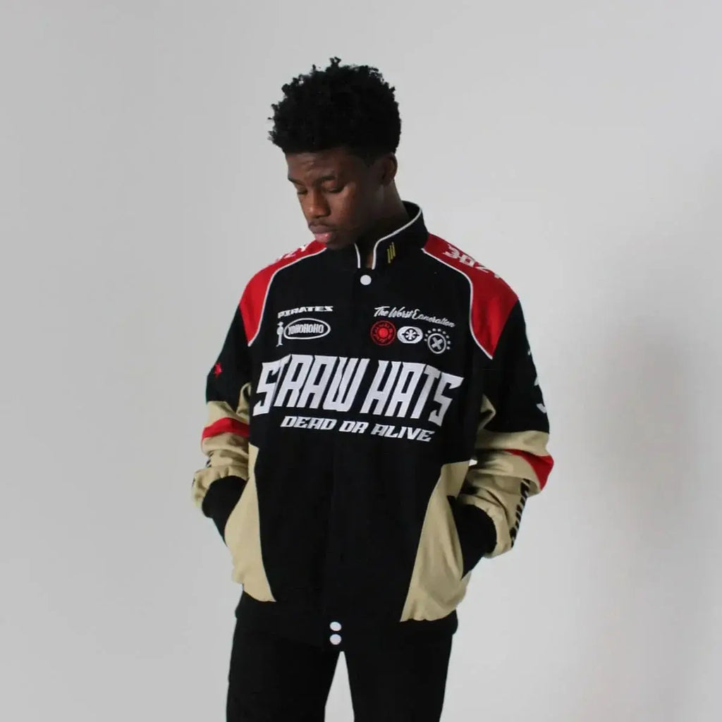 Model wearing Straw Hat Pirates bomber jacket with bold anime-inspired graphics